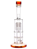 Front Side: Clear glass water pipe featuring double chamber straight tube with tree percs and honeycomb perc, and amber color accents, available for sale at High Roller Smoke in Lakewood, Colorado. 