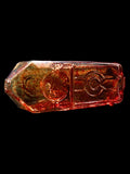 Red heady glass hand pipe by American artist Kuhns Glass with engraved Colorado depictions on all four sides 