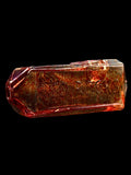 Red heady glass hand pipe by American artist Kuhns Glass with engraved Red Rocks lettering on one side
