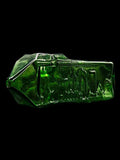 Green heady glass hand pipe by American artist Kuhns Glass with engraved Denver city skyline on one side