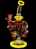 11 inch glass water pipe rig by Lookah Tataoo Glass, featuring a red fish and  yellow and amber color accents, for sale at High Roller Smoke in Lakewood, Colorado.